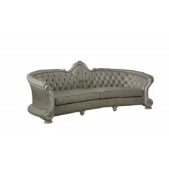 Leather white sofa with seven toss pillows in a comfortable studio couch design