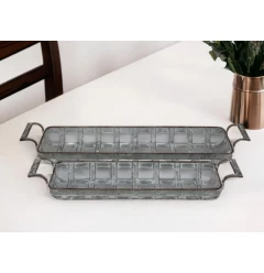 gray metal handmade tray with handles on wooden table