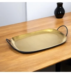 rectangular stainless steel serving tray with handles on wooden table
