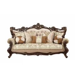 Walnut upholstered sofa with wood leg trim and pillows on a brown rectangle couch with comfort design