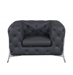 alt=Glam gray chrome tufted leather armchair with comfortable rectangular design