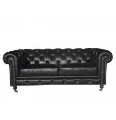 Black leather sofa with comfortable cushioning and modern design