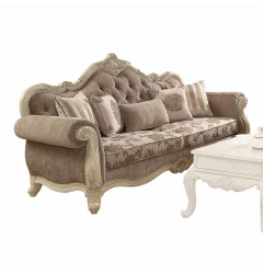 White upholstery poly resin sofa with pillows and wooden accents in a studio setting