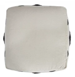 White cotton ottoman with beige fashion accessory and serveware elements