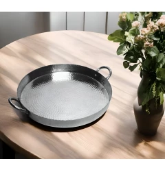 stainless steel handmade serving tray with handles on table with flowerpot and dishware