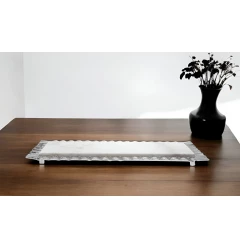 white silver rectangular marble serving tray on wooden table with plant and vase