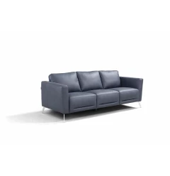 Blue leather sofa with comfortable rectangular studio couch design and wooden flooring