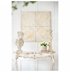 whitewashed arabesque carved wall art with plant and interior design elements