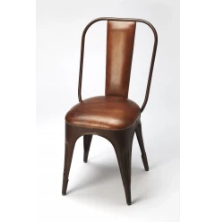 Brown faux leather side chair with wood legs and metal armrests