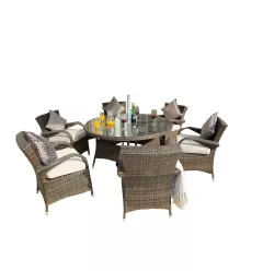 Brown outdoor dining set with washed cushion on chair and wood table with flowerpot
