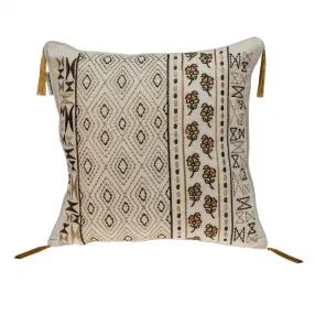 Gold bronze embroidered decorative throw pillow on beige couch
