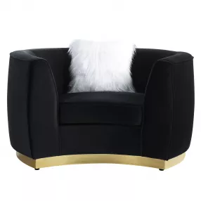Black velvet chair with armrests for comfortable seating in furniture category