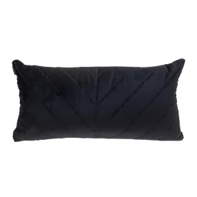 Black velvet lumbar pillow with decorative arrows pattern and fashion accessory accents