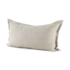 Beige cream bordered lumbar pillow cover on couch with throw pillow accessories