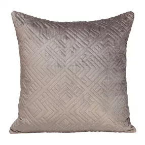 Quilted taupe decorative throw pillow on couch with elegant pattern