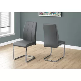 Two 77.5" Grey Leather Look Chrome Metal And Foam Dining Chairs