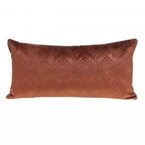terra cotta velvet lumbar accent pillow on wooden surface with linen texture