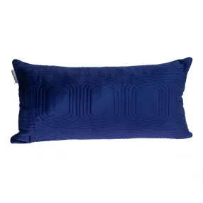 Quilted velvet blue lumbar throw pillow on couch with electric blue accent