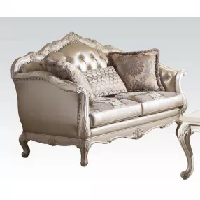 63" Rose Gold And Pearl Faux Leather Curved Loveseat and Toss Pillows