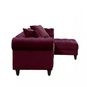 Red velvet L-shaped seating component with comfortable magenta studio couch design