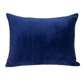 navy blue lumbar tufted throw pillow with electric blue pattern on couch