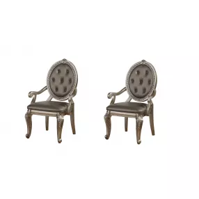 Set of Two Tufted Champagne Upholstered Faux Leather Dining Arm Chairs