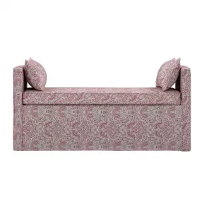 Red black upholstered linen paisley bench against brick background with wooden accents