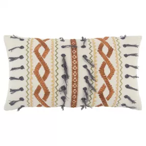 Rust gray ribbon embroidered lumbar pillow with patterned linens and fashion accessory details