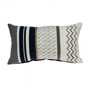 Boho geo braid lumbar pillow on couch with decorative throw pillow and linens