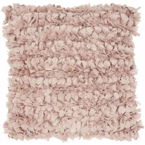 Light pink shag throw pillow with a subtle beige pattern and soft texture