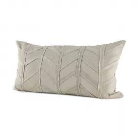 Gray chevron textured lumbar pillow cover on beige wood with natural material accents