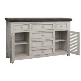Solid manufactured wood distressed buffet table with cabinetry drawers and shelving