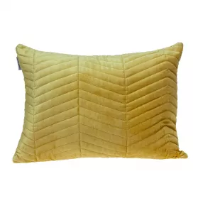 Velvet zig zag pattern decorative lumbar pillow on wood with textured linens