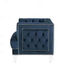 Blue velvet black tufted armchair with electric blue pattern and fashion accessory elements