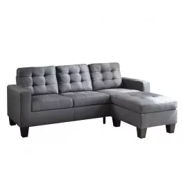 Gray black linen sofa ottoman with pillows in a comfortable studio couch setup