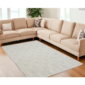 off white geometric dhurrie area rug with brown and white pattern in a modern interior with wooden furniture