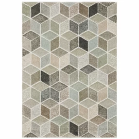 power loom stain resistant area rug in brown beige and grey on tile flooring