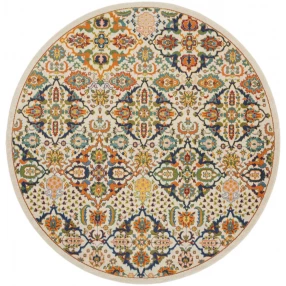 round floral power loom area rug with blue artistic pattern and symmetrical motif