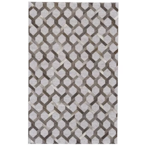 silver geometric hand woven area rug in grey and beige on wooden floor