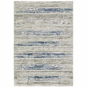 6' X 9' Blue Ivory Grey Light Blue And Brown Abstract Power Loom Stain Resistant Area Rug