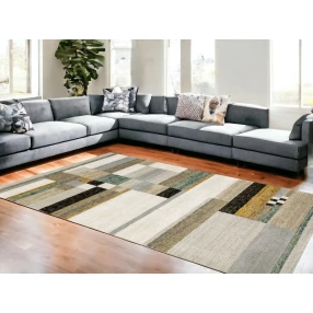 rust geometric power loom area rug in living room with brown couch and black table
