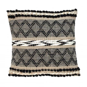 Black sand woven decorative pillow with textured pattern