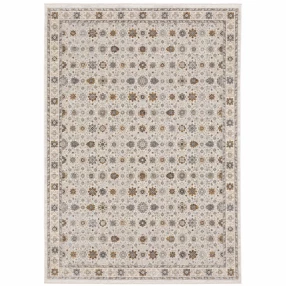 8' X 11' Ivory And Gold Oriental Power Loom Stain Resistant Area Rug With Fringe