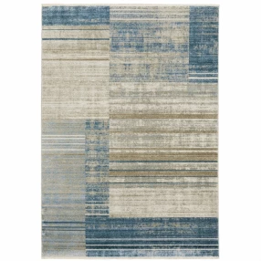 loom stain resistant area rug with fringe in beige and aqua pattern