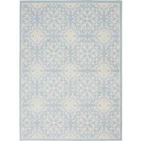 blue floral power loom area rug with purple aqua and electric blue symmetrical motif