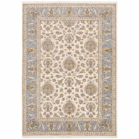 6' X 9' Ivory And Blue Oriental Power Loom Stain Resistant Area Rug With Fringe