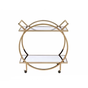 Champagne metal tube serving cart with serveware and dishware on oval and circular shelves