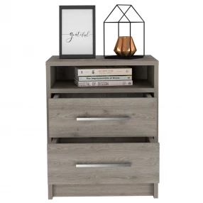 Light grey open compartment nightstand with wood chest of drawers and lamp