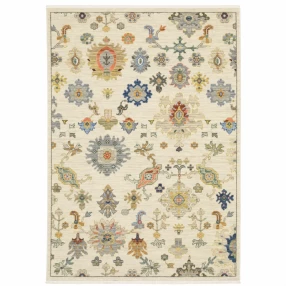 3' X 5' Ivory Beige Gold Grey Blue Pink Red Rust And Green Oriental Power Loom Stain Resistant Area Rug With Fringe