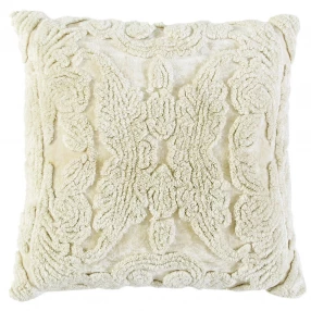 ivory botanical tufted pattern throw pillow with beige symmetrical embellishments on linens